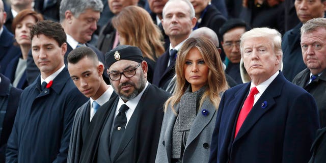 President Donald Trump, first lady Melania Trump, Morocco's King Mohammed VI, his son Crown Prince Moulay and Canadian Prime Minister Justin Trudeau, left, attend a commemoration ceremony for Armistice Day at the Arc de Triomphe in Paris. (AP)