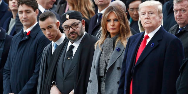 President Donald Trump, first lady Melania Trump, Morocco's King Mohammed VI, his son Crown Prince Moulay and Canadian Prime Minister Justin Trudeau, left, attend a commemoration ceremony for Armistice Day at the Arc de Triomphe in Paris. (AP)