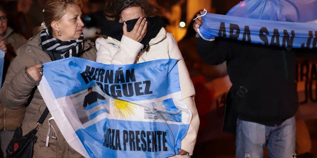 Relatives of the crew of the ARA San Juan submarine embrace outside the navy base in Mar del Plata, Argentina, Saturday.