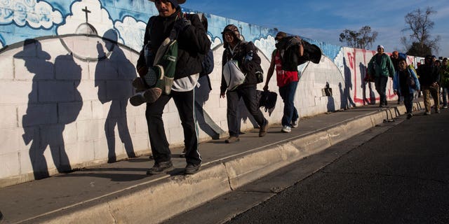 The migrants, who are part of a caravan of migrants from Central America, leave Mexicali to travel to Tijuana, Mexico on Tuesday, November 20, 2018. The tension has settled while near 3,000 caravan migrants have poured into Tijuana in recent days, after more than a month late. road.