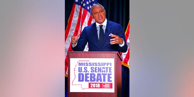 Democrat Mike Espy answers a question during a televised Mississippi U.S. Senate debate with his opponent appointed U.S. Sen. Cindy Hyde-Smith, R-Miss., in Jackson, Miss., Tuesday, Nov. 20, 2018. 