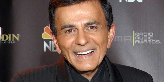 In this Oct. 27, 2003, file photo, Casey Kasem poses for photographers after receiving the Radio Icon award during The 2003 Radio Music Awards at the Aladdin Resort and Casino in Las Vegas.