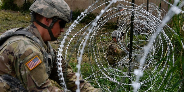 President Trump on Saturday referred to the barbed wire as 