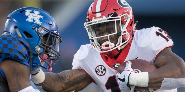 A woman fired a gun at her family because they wouldn't turn off the Georgia football game, police say.