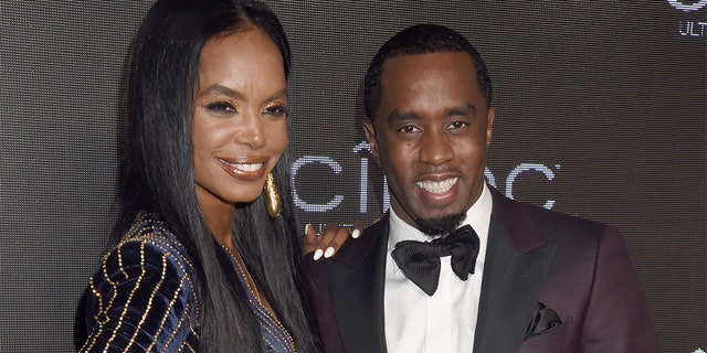 Kim Porter and Sean "Diddy" Combs are pictured here in 2015. According to TMZ, the model died on Thursday. She was 47.