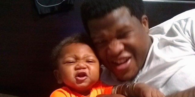 This photo provided by Avontea Boose shows her baby Tristan Roberson and the boy's father Jemel Roberson.