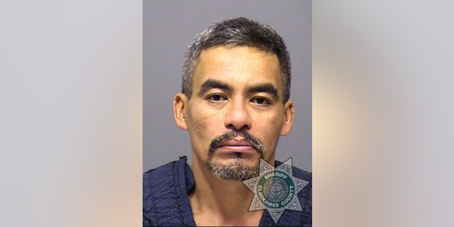 This photo released Oct. 29, 2018 by the Clackamas County Sheriff's Office shows Martin Gallo-Gallardo. Federal officers have accused authorities in Oregon of preventing them from taking a Mexican national into custody before he was released in a domestic violence case and went on to be charged with murder. Martin Gallo-Gallardo, who was in the U.S. illegally, posted bond in March and was released from jail in Portland when his wife and a daughter stopped cooperating with prosecutors and a grand jury declined to indict him, The Oregonian/OregonLive reported Friday, Nov. 2, 2018. (Clackamas County Sheriff's Office via AP)