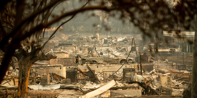 Leveled residences line a block following the Camp Fire in Paradise, Calif., on Monday, Nov. 12, 2018. (AP Photo/Noah Berger)