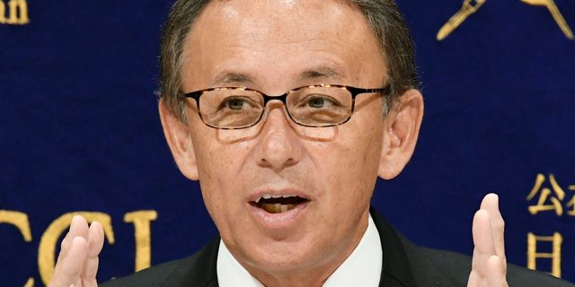 Okinawa Gov. Denny Tamaki speaks during a press conference at the Foreign Correspondents' Club of Japan (FCCJ) in Tokyo, Friday, Nov. 9, 2018. Gov. Tamaki talked to the media ahead of his U.S. trip to raise awareness among Americans about the tiny southern island's burden of hosting most of American troops (Sadayuki Goto/Kyodo News via AP)