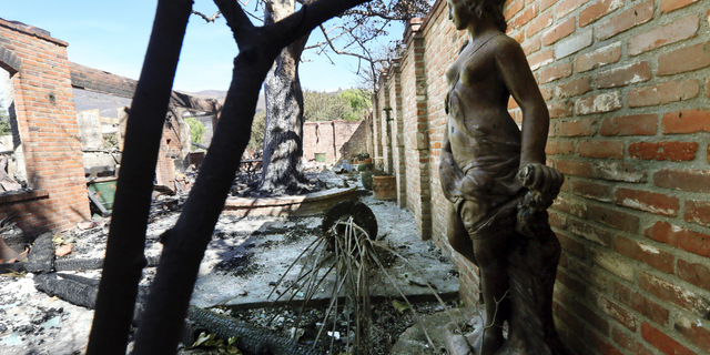 The Malibu, Calif., villa of German TV presenter Thomas Gottschalk lies in ruins from the Woolsey fire Tuesday, Nov. 13, 2018.(AP Photo/Reed Saxon)