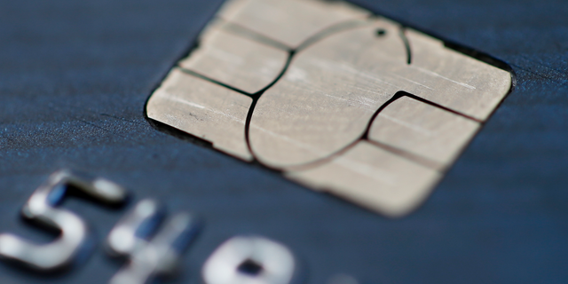 FILE- This June 10, 2015, file photo shows a chip credit card in Philadelphia. On Wednesday, Nov. 7, 2018, the Federal Reserve releases its September report on consumer borrowing. (AP Photo/Matt Rourke, File)