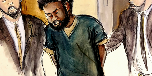 FILE - In this Jan. 11, 2018 court room file drawing, U.S. Marshals escort defendant Akayed Ullah, center, into court in New York for his arraignment on charges of setting off a pipe bomb in New York City's busiest subway station at rush hour last Dec. 11. A guilty verdict against the Bangladeshi immigrant was returned on Tuesday, Nov. 6, 2018, in Manhattan federal court.(Elizabeth Williams via AP, File)