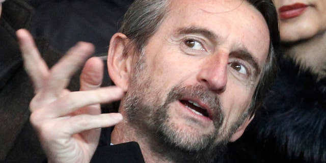 FILE - In this file photo dated Friday, Feb. 14, 2014, Paris Saint Germain's Jean-Claude Blanc, prior to the French League one soccer match between Paris Saint Germain and Valenciennes, at the Parc des Princes stadium, in Paris. PSG's deputy chief executive officer Jean-Claude Blanc spoke of his outrage Thursday Nov. 8, 2018, and pledged an investigation into some club scouts who secretly and illegally profiled potential young recruits from outside the Paris region with lists containing their ethnic origins.(AP Photo/Thibault Camus, FILE)