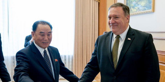 FILE - In this July 7, 2018, file photo, U.S. Secretary of State Mike Pompeo, right, and Kim Yong Chol, a North Korean senior ruling party official and former intelligence chief, arrive for a lunch at the Park Hwa Guest House in Pyongyang, North Korea.   Secretary of State Pompeo will be traveling to New York on Thursday, Nov. 8, 2018, to meet with his North Korean counterpart, Kim Yong Chol. (AP Photo/Andrew Harnik, Pool, File)