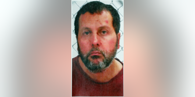 FILE - This undated file photo released by the FBI, shows Amor Ftouhi, of Canada. Ftouhi was indicted in the stabbing of a police officer on June 21, 2017, at an airport in Flint, Mich. A judge has ordered federal marshals to use a "minimum amount of force" if necessary to bring Ftouhi to court for a final hearing before he faces trial in the stabbing. He's due in court again Thursday, Oct. 25, 2018, to discuss the Nov. 5 trial. Ftouhi declined to leave his cell during a previous hearing in Flint federal court. (FBI via AP, File)