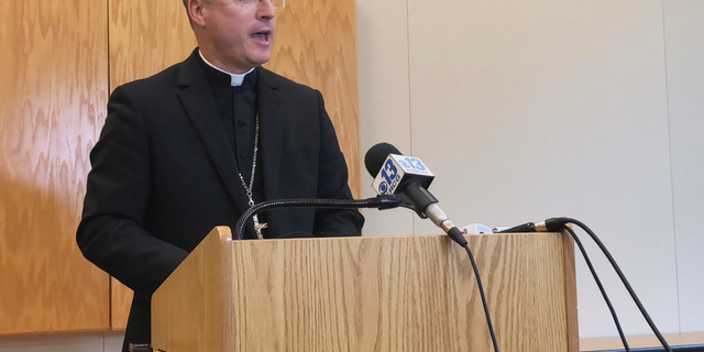 Bishop W. Shawn McKnight, of the Roman Catholic Diocese of Jefferson City, Mo., speaks at a news conference Thursday, Nov. 8, 2018. McKnight released a complete list of the names of 33 priests or religious brothers in the Jefferson City diocese have been "credibly accused" and/or removed from the ministry over sexual abuse of minor. This follows an internal investigation that began in February 2018. (AP Photo/Summer Ballentine)