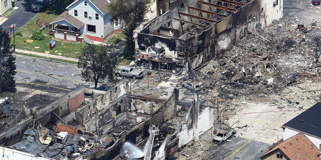 FILE - In this July 11, 2018, file photo, shows the aftermath of a gas explosion in downtown Sun Prairie, Wis. Court documents say a contractor failed to properly mark a natural gas line that was struck and caused the deadly explosion the day before. (John Hart/Wisconsin State Journal via AP, File)