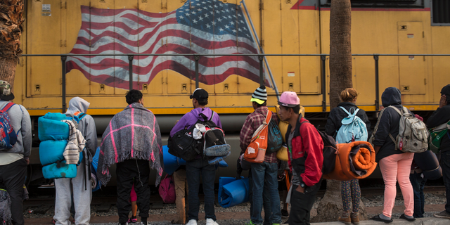 Central American migrants, part of the Central American caravan trying to reach the United States, continue their journey as they prepare to leave Mexicali, Mexico, Tuesday, Nov. 20, 2018. Tensions have built as nearly 3,000 migrants from the caravan poured into Tijuana in recent days after more than a month on the road, and with many more months likely ahead of them while they seek asylum in the U.S. (AP Photo/Rodrigo Abd)