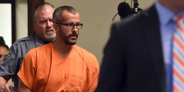 FILE - In this Aug. 16, 2018, file photo, Christopher Watts is escorted into the courtroom before his bond hearing at the Weld County Courthouse in Greeley, Colo. The Colorado man, charged with killing his pregnant wife and two daughters, has pleaded guilty Tuesday, Nov. 6, 2018, under a plea deal that will allow him to avoid the death penalty. (Joshua Polson/The Greeley Tribune via AP, Pool, file)