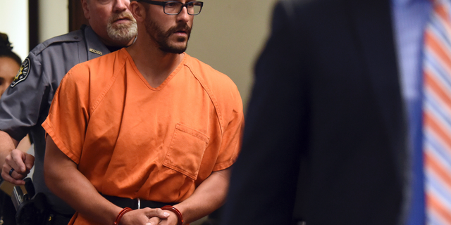 FILE - In this Aug. 16, 2018, file photo, Christopher Watts is escorted into the courtroom before his bond hearing at the Weld County Courthouse in Greeley, Colo. The Colorado man, charged with killing his pregnant wife and two daughters, has pleaded guilty Tuesday, Nov. 6, 2018, under a plea deal that will allow him to avoid the death penalty. (Joshua Polson/The Greeley Tribune via AP, Pool, file)