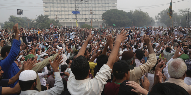 Radical Islamists rally to condemn a Supreme Court decision that acquitted Asia Bibi, a Christian woman, who spent eight years on death row accused of blasphemy, in Lahore, Pakistan, Thursday, Nov. 1, 2018. Bibi plans to leave the country, her family said Thursday, as Islamists mounted rallies demanding Bibi be publicly hanged. The Islamists also called for the killing of the three judges, including Chief Justice Mian Saqib Nisar, who acquitted Bibi. (AP Photo/K.M. Chaudary)