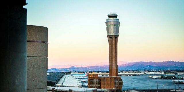 FILE - This Aug. 6, 2014 file photo shows the news FAA tower under construction at McCarran International Airport in Las Vegas. The air traffic control tower is temporarily closing after a controller at the facility tested positive for coronavirus on Wednesday, according to the Federal Aviation Administration (FAA) on Thursday.<br data-cke-eol="1">
(Jeff Scheid/Las Vegas Review-Journal via AP, File)