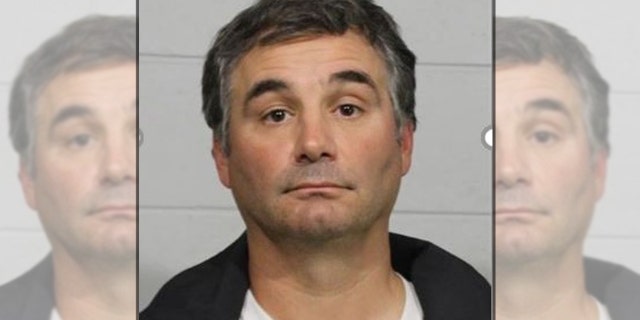 Marcus Dempsey, 43, was arrested on Monday after slapping a youth football player who injured his son on a tackle, police said.
