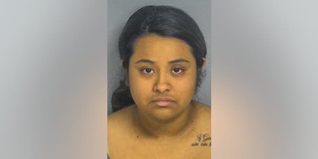 Dalia Garcia, 23, is charged with tampering with evidence in connection with three deaths in Missouri, authorities say. (Greene County, Mo., Jail)
