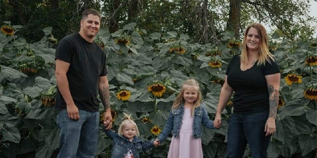 Chelsi and Anthony Dean and their children Kaytlin, 5, and Avri, 1.