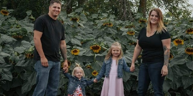 Chelsi and Anthony Dean and their children Kaytlin, 5, and Avri, 1.