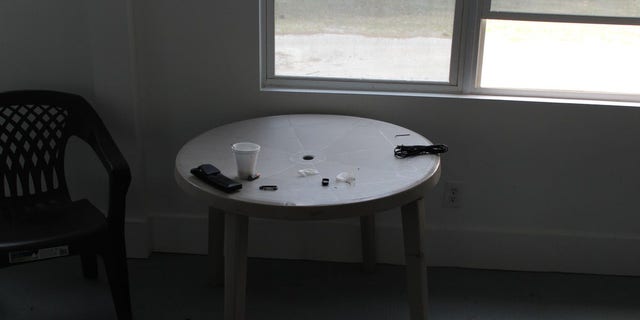Jackson left a used Styrofoam cup on a table near an open window.