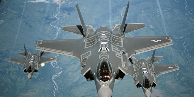 File photo - F-35A Lightning II aircraft receive fuel from a KC-10 Extender from Travis Air Force Base, Calif., July 13, 2015, during a flight from England to the U.S. (U.S. Air Force photo/Staff Sgt. Madelyn Brown)