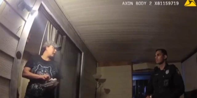 Jamie McKee explains to an officer that her family was just playing "Call of Duty' and there was no violence inside her home.
