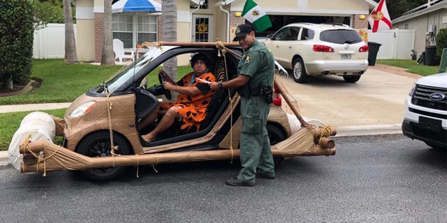 A man driving a Flinstone "foot mobile" was pulled over and "ticketed" by police earlier this month.