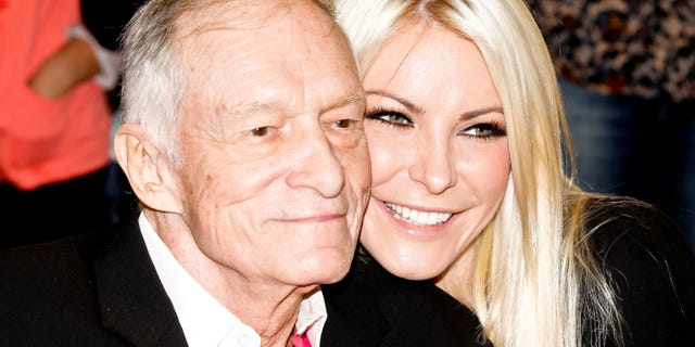 Hugh Hefner and Crystal Harris attend the Beverly Hills City Council and Playboy Enterprises ribbon-cutting ceremony for Beverly Hills Playboy World Headquarters on August 7, 2012 in Beverly Hills, Calif.