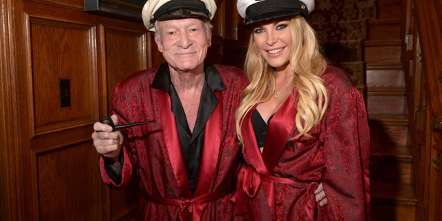 Hugh Hefner and Crystal Hefner attend Playboy Mansion's Annual Halloween Bash at The Playboy Mansion on October 25, 2014 in Los Angeles, Calif.