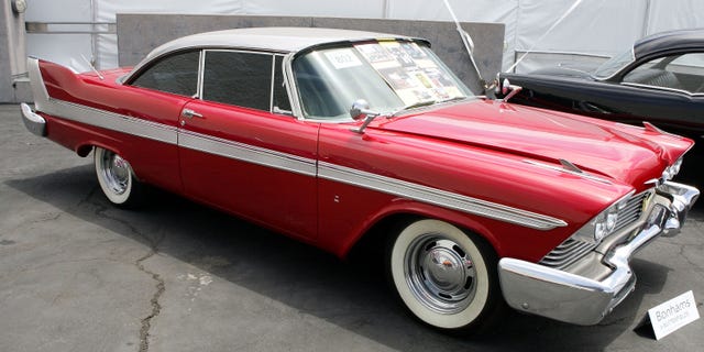 The Plymouth Fury from the movie "Christine" is displayed at the Barris Star Car Collection Auction at the Petersen Automotive Museum.