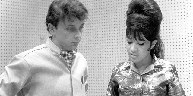 Ronnie Spector of the Ronettes vocal trio with Phil Spector during a recording in Los Angeles, California at Gold Star Studios in 1963.