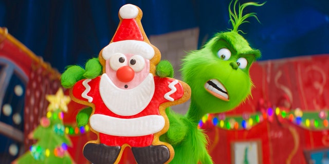 This image released by Universal Pictures shows the character Grinch, voiced by Benedict Cumberbatch, in a scene from "The Grinch." (Universal Pictures via AP)