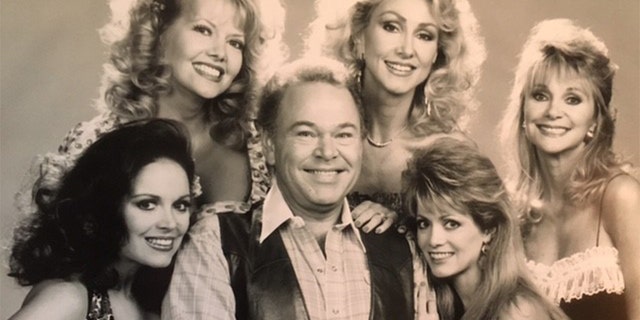 Roy Clark center; Honeys surrounding Roy, clockwise from top left: Linda Thompson, Gunilla Hutton, Irlene Mandress, Victoria Hallman, Misty Rowe.