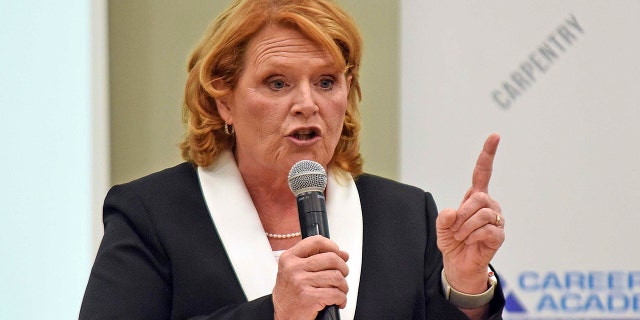 North Dakota Democratic U.S. Sen. Heidi Heitkamp makes a point in a debate with Republican Rep. Kevin Cramer.