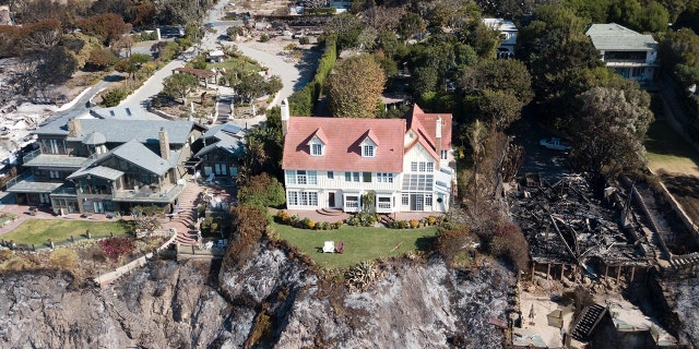 Hopkins' Malibu appeared so pristine in the midst of the wildfire, even his two deckchairs were neatly positioned in the front garden.