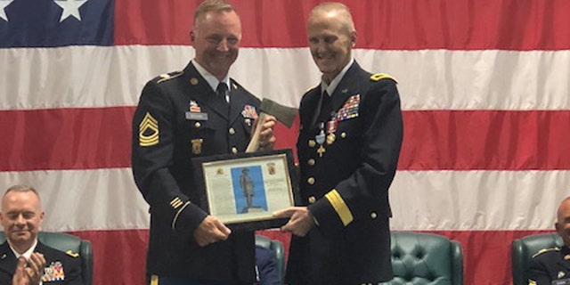 Heston (right) was one of the most decorated and highest ranking officers in Vermont's Army National Guard.