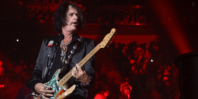 Aerosmith's Joe Perry plays "Walk This Way" with Billy Joel at Billy Joel's 104th Show at Madison Square Garden on November 10, 2018 in New York City.