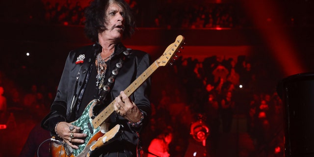 Aerosmith's Joe Perry plays "Walk This Way" with Billy Joel at Billy Joel's 104th Show at Madison Square Garden on November 10, 2018 in New York City.