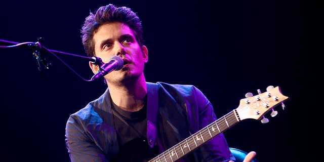 John Mayer performs on stage during iHeartRadio LIVE at the iHeartRadio Theater on October 24, 2018 in Burbank, California.