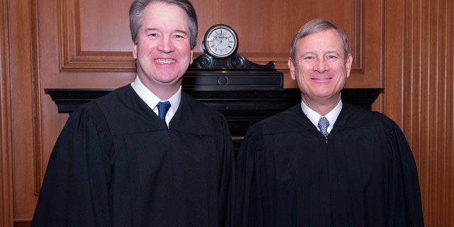 Associate Justice Brett Kavanaugh with Chief Justice John Roberts.