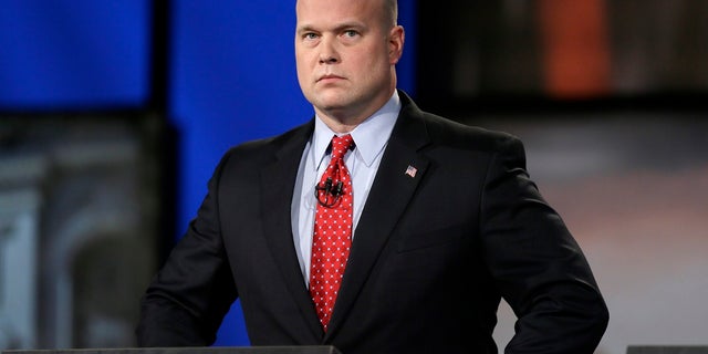 FILE -Then-Iowa Republican senatorial candidate and former U.S. Attorney Matt Whitaker watches before a live televised debate in Johnston, Iowa.