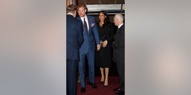 Prince Harry, Duke of Sussex and Meghan, Duchess of Sussex attend the Royal British Legion Festival of Remembrance at the Royal Albert Hall on November 10, 2018 in London, England.