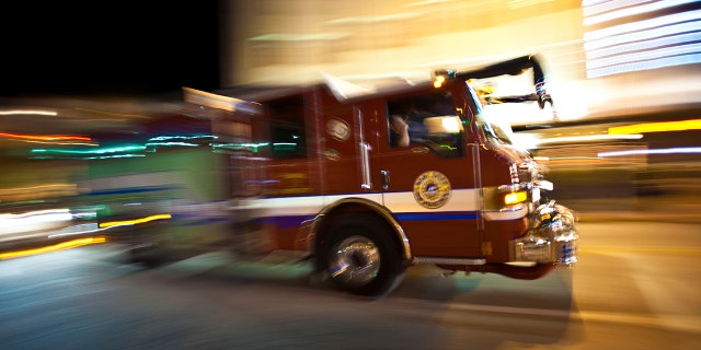 At least one person was killed Tuesday when a small plane crashed in Sioux Falls, S.D., and sparked a fire. Pictured: A firetruck speeds to an emergency scene in an undated photo.